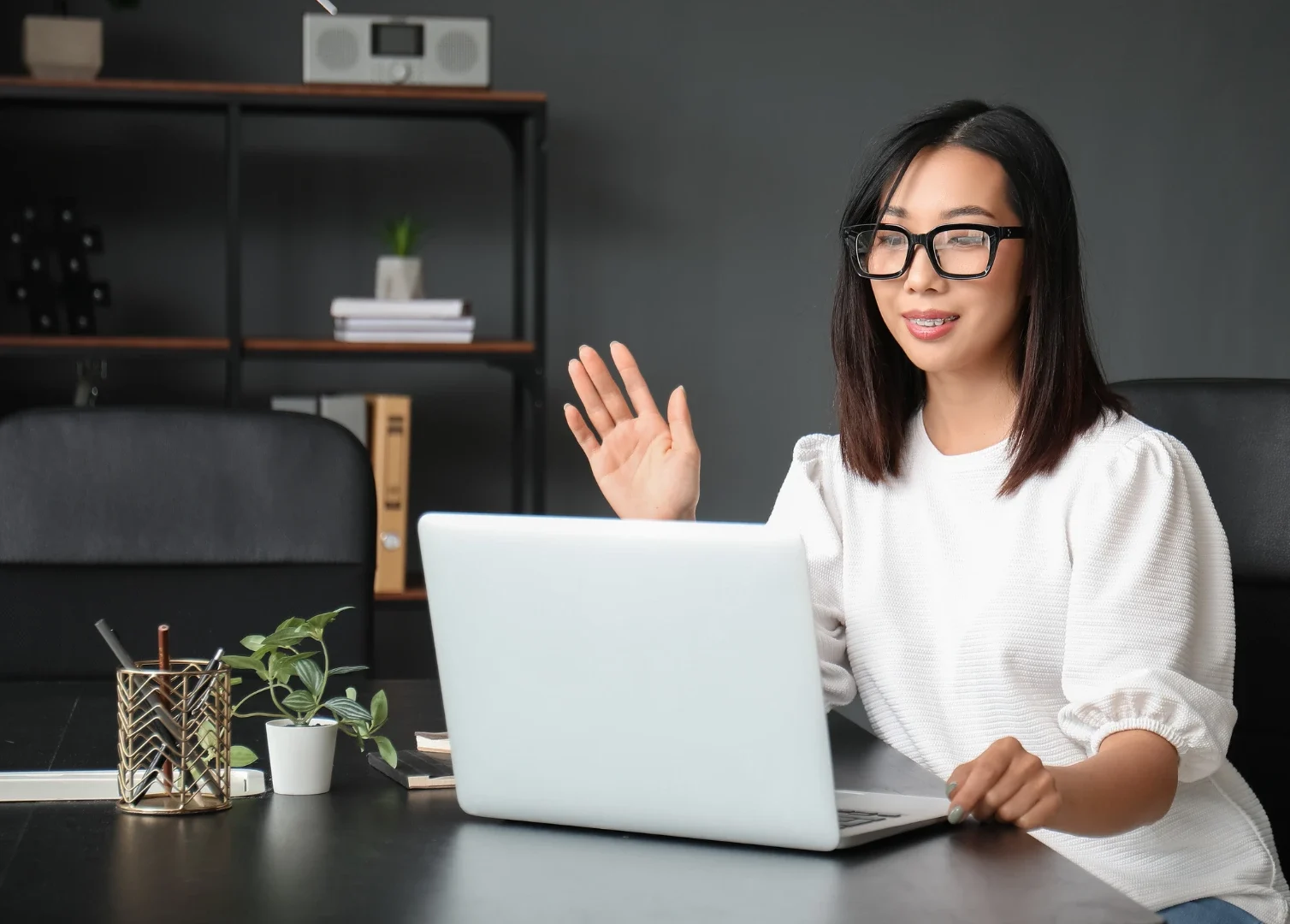 An AHEAD HR team member on a call with a client