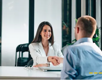 AHEAD HR team member meeting with a local business owner